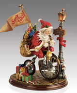 рождественская статуэтка авторская - Санта Клаус на велосипеде