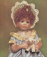 Фарфоровая сидячая кукла  - Люси 