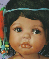 Фарфоровая кукла  - Индеец с мишкой
