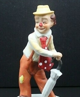 фарфоровые клоуны,
фарфоровая статуэтка клоун,
купить фарфорового клоуна - Клоун с зонтиком
